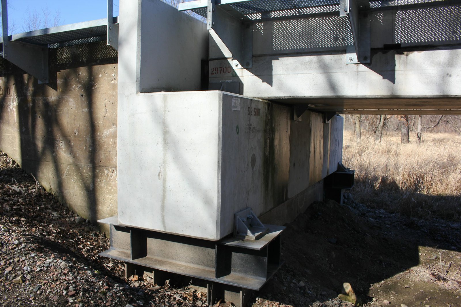 Retrofitted west abutment